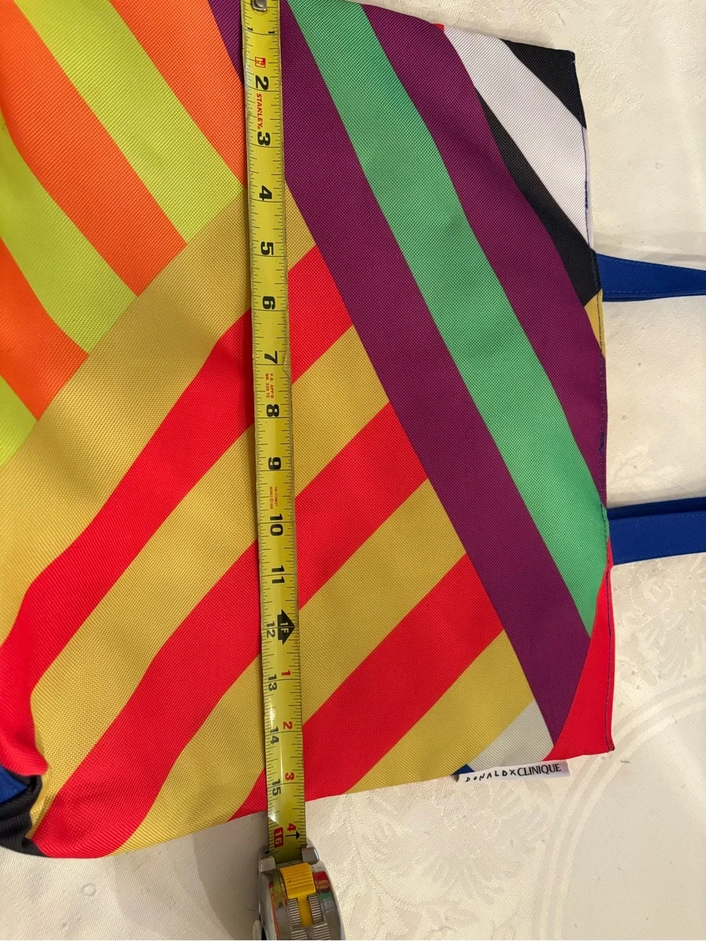 Clinique Multi-Color Diagonal Stripe Tote with Blue Handles